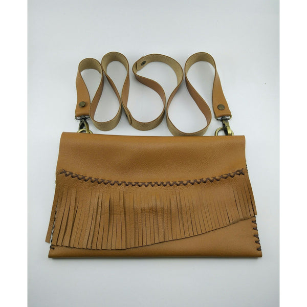 Tan Leather Bag With Tassel Cover.